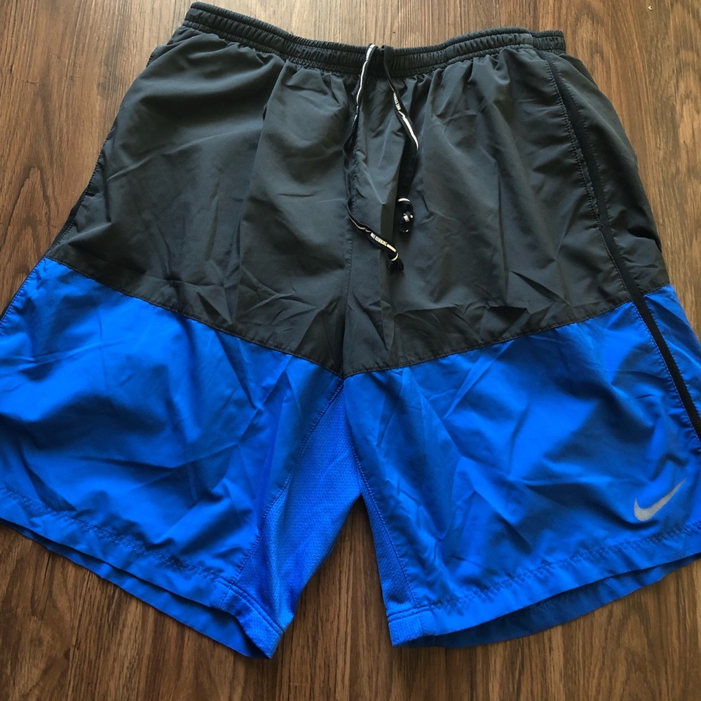 Men’s Two Tone Nike running shorts.
